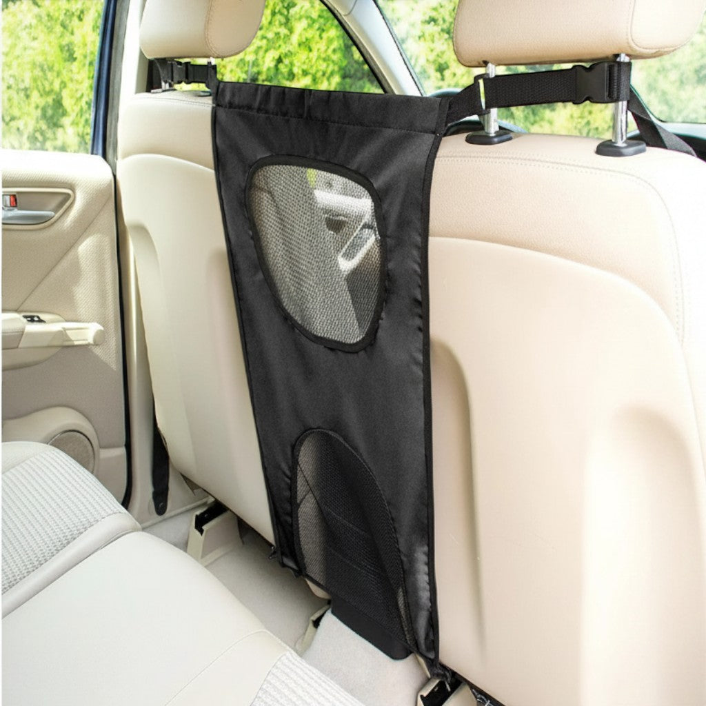 Filet de séparation AventureCanine en nylon noir pour chien, installé entre les sièges avant d'une voiture.