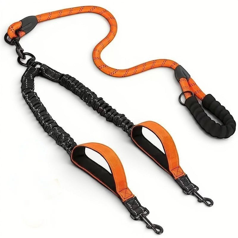 Laisse double AventureCanine en nylon orange et noir avec bandes réfléchissantes, émerillon rotatif et poignées