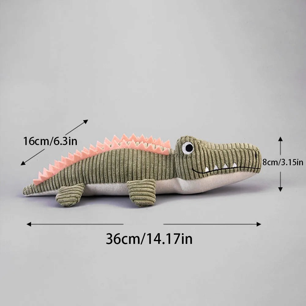 Peluche crocodile AventureCanine en velours côtelé vert avec crête rose, jouet couineur pour chien