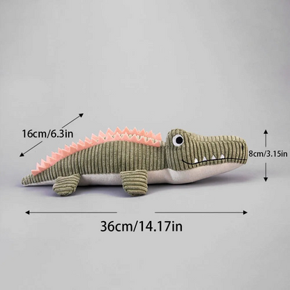 Peluche crocodile AventureCanine en velours côtelé vert avec crête rose, jouet couineur pour chien